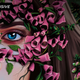 A woman's face covered in flowers